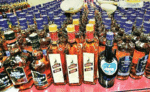 स्कूल से बरामद की 255 कार्टन विदेशी शराब